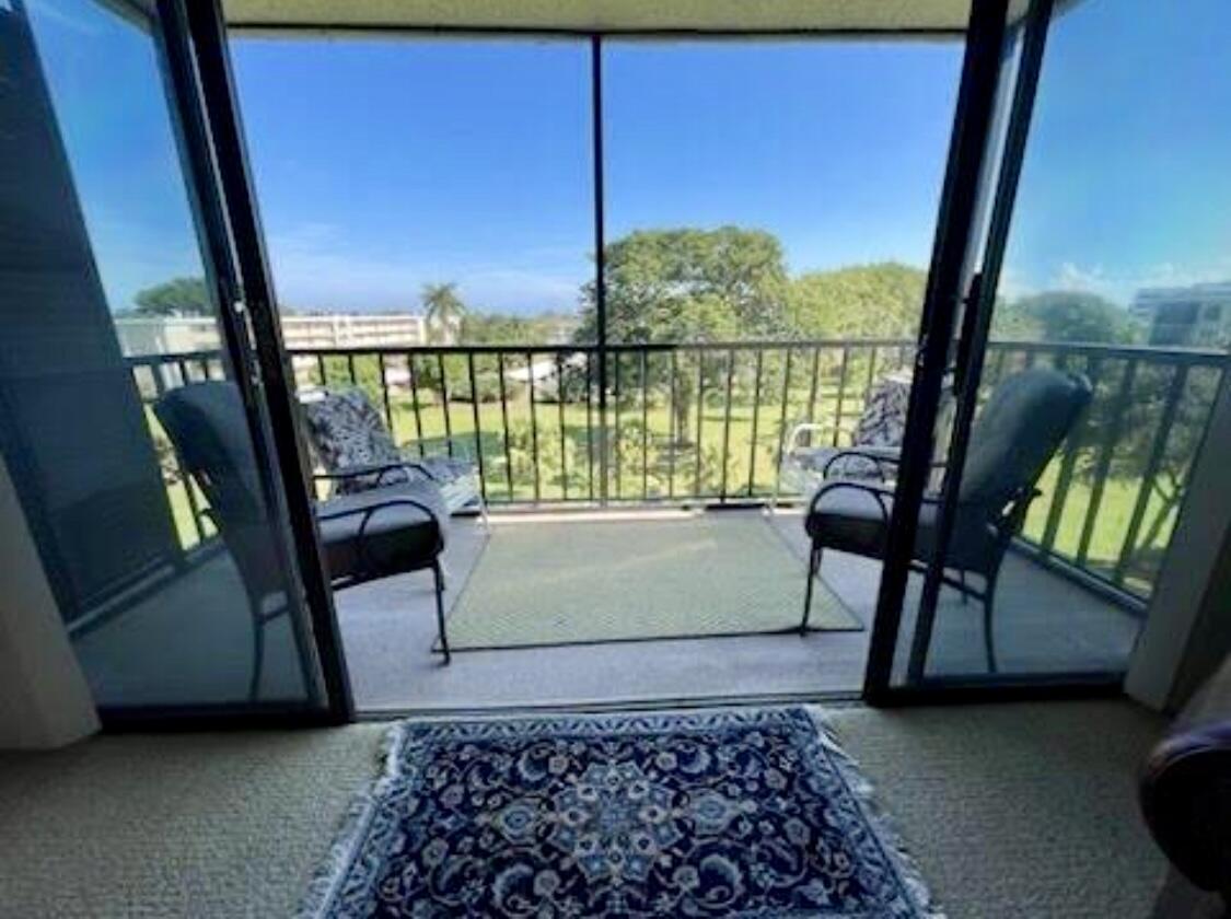 300 North Hwy A1A, Unit 405M Jupiter, FL 33477 - Photo 9 of 11 a view of a balcony with chairs