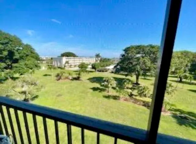 a view of a large window with an outdoor space