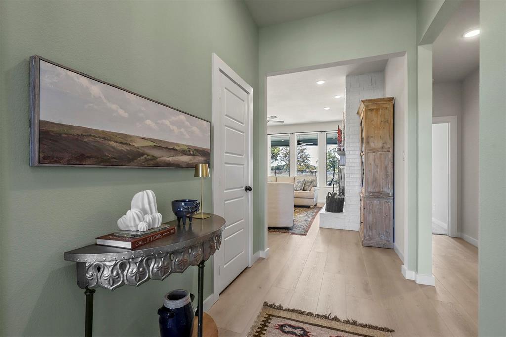 317 Skeen Peak Springtown, TX 76082 - Photo 3 of 14 a living room with furniture and wooden floor