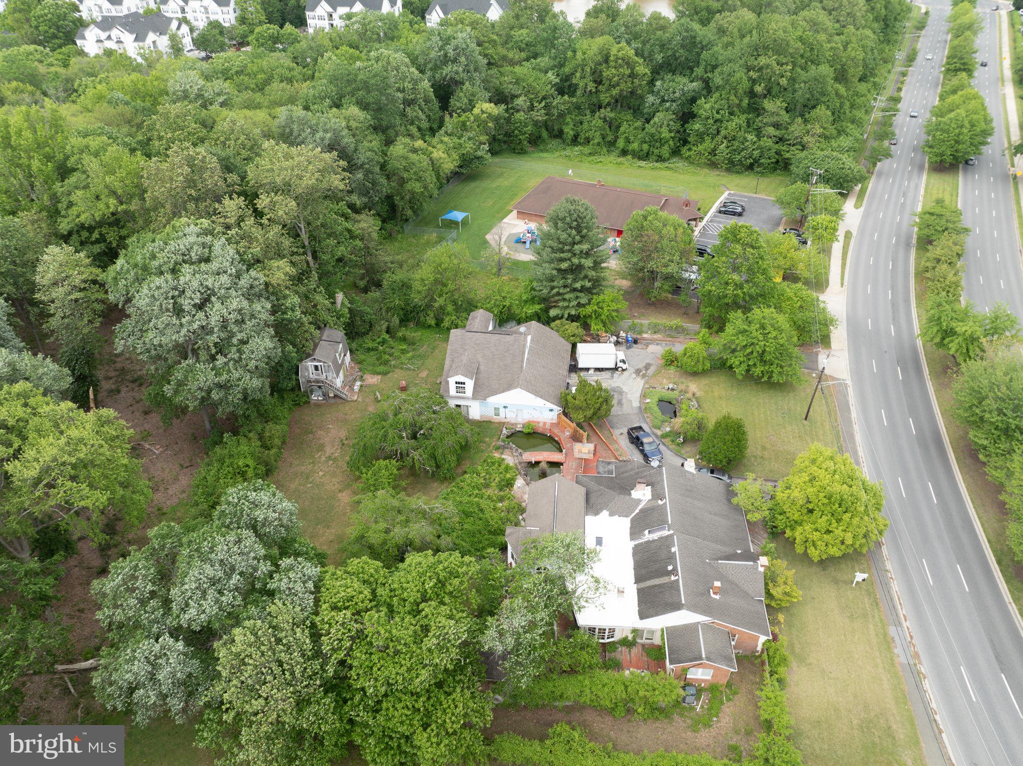 3502 Mitchellville Road Bowie, MD 20716 - Photo 14 of 14 an aerial view of house with yard swimming pool and outdoor seating