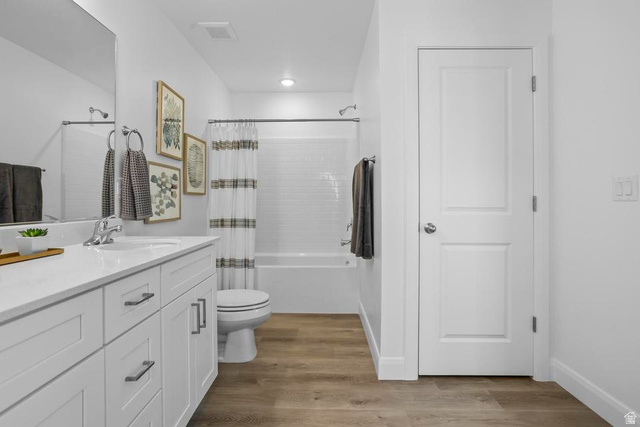488 West Greenstone Pl Street, Unit 1010 St. George, UT 84790 - Photo 27 of 34 Well-appointed bathroom featuring a white vanity with a quartz countertop, an undermount sink, and chrome fixtures