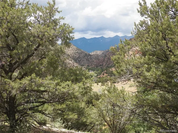 a view of a city and mountains