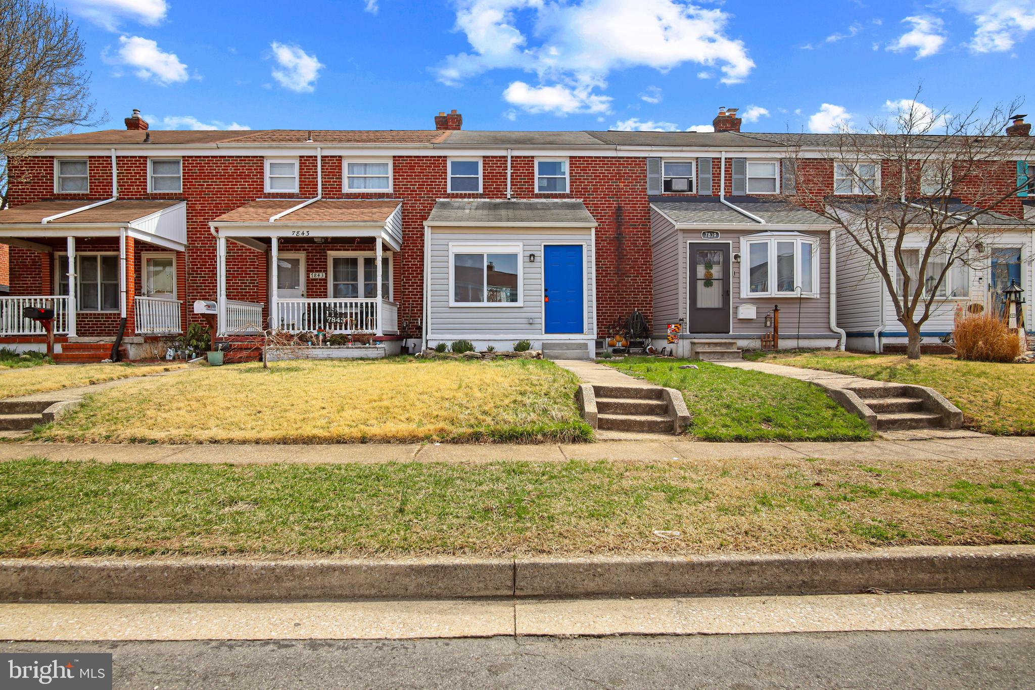 7841 Charlesmont Road Baltimore, MD 21222 - Photo 1 of 43 a front view of residential houses with yard