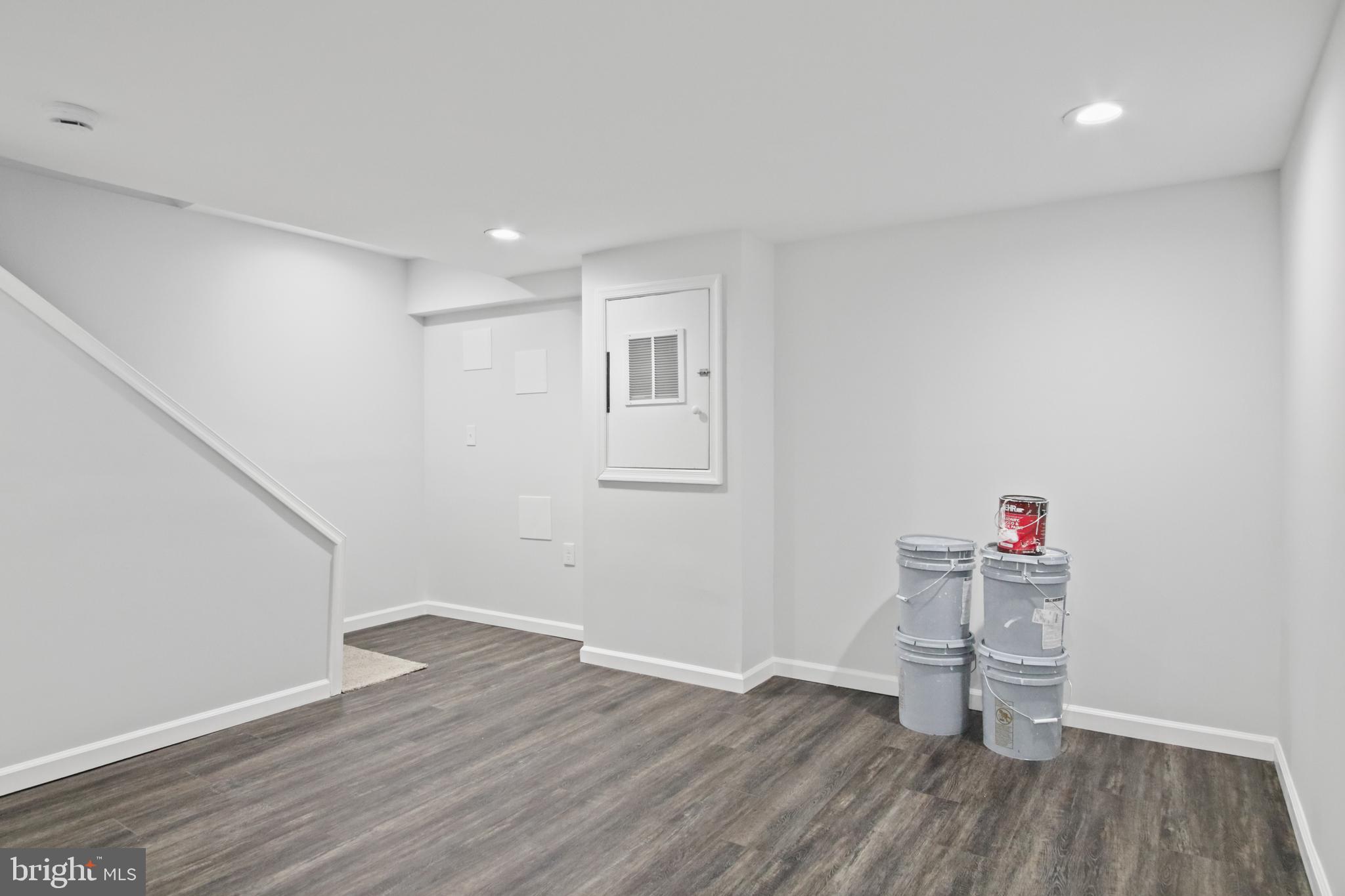 7841 Charlesmont Road Baltimore, MD 21222 - Photo 19 of 43 a view of a room with wooden floor and sink