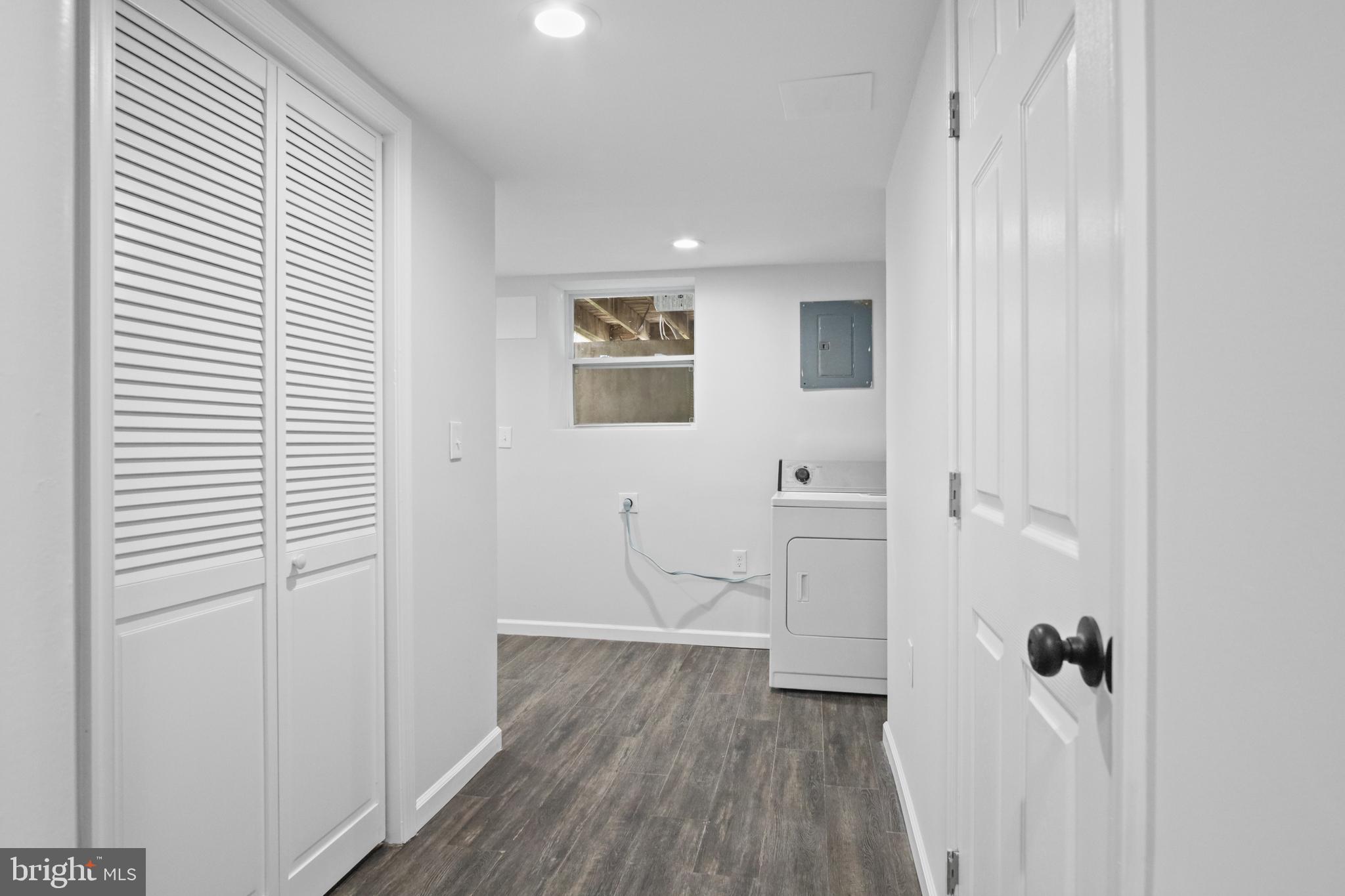 7841 Charlesmont Road Baltimore, MD 21222 - Photo 21 of 43 a view of a hallway with wooden floor and closet