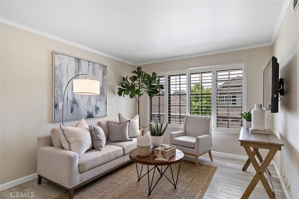 6247 Majorca Circle Long Beach, CA 90803 - Photo 1 of 57 a living room with furniture and a large window