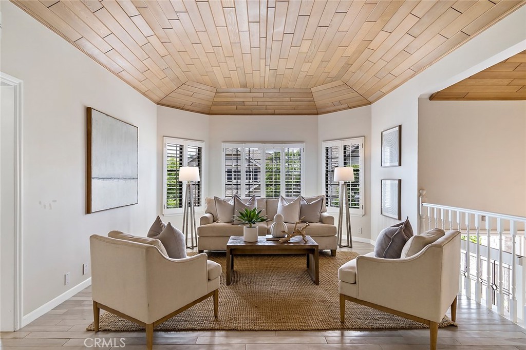 6247 Majorca Circle Long Beach, CA 90803 - Photo 11 of 57 a living room with furniture and floor to ceiling window