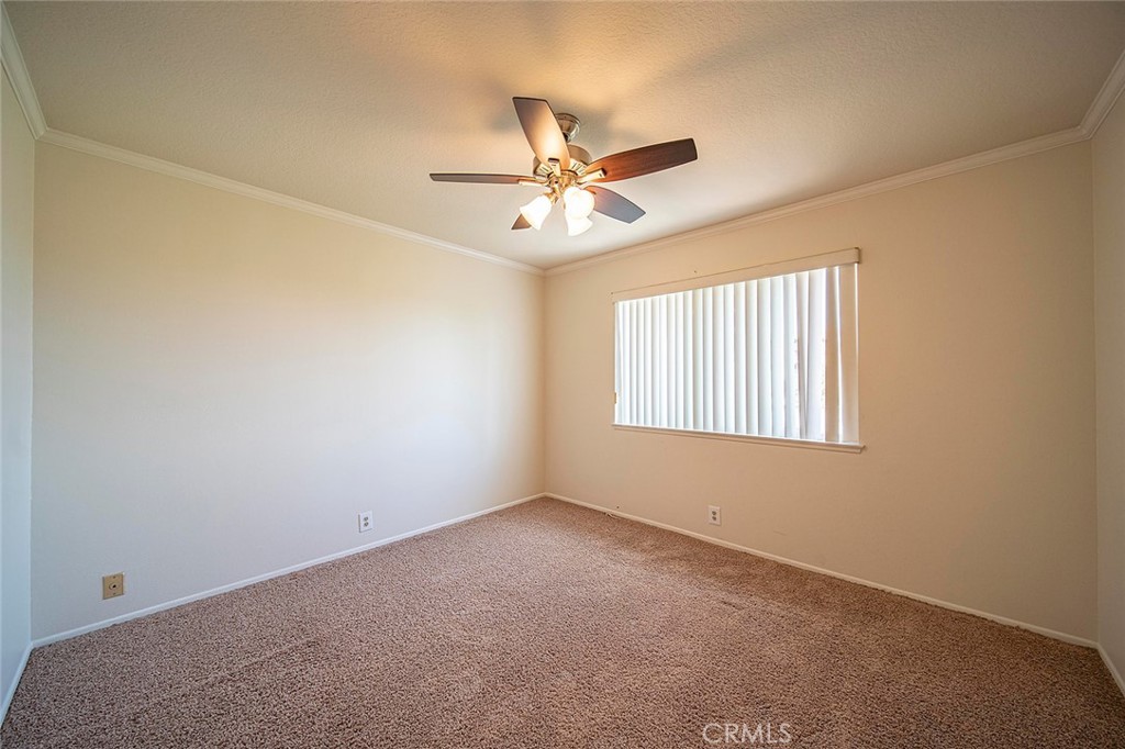 6247 Majorca Circle Long Beach, CA 90803 - Photo 27 of 57 an empty room with windows and fan