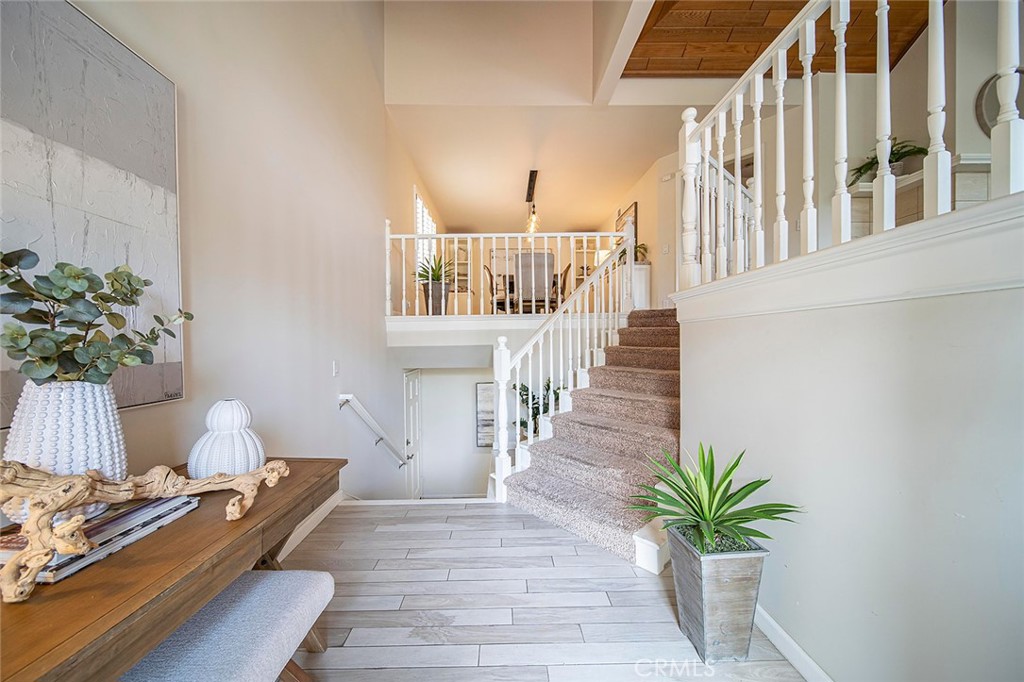 6247 Majorca Circle Long Beach, CA 90803 - Photo 31 of 57 a living room with furniture and a chandelier