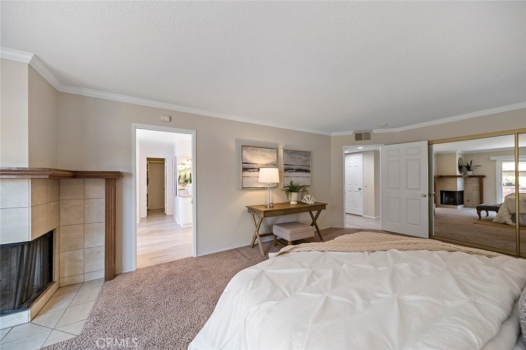 6247 Majorca Circle Long Beach, CA 90803 - Photo 36 of 57 a bedroom with a bed and a chair in it