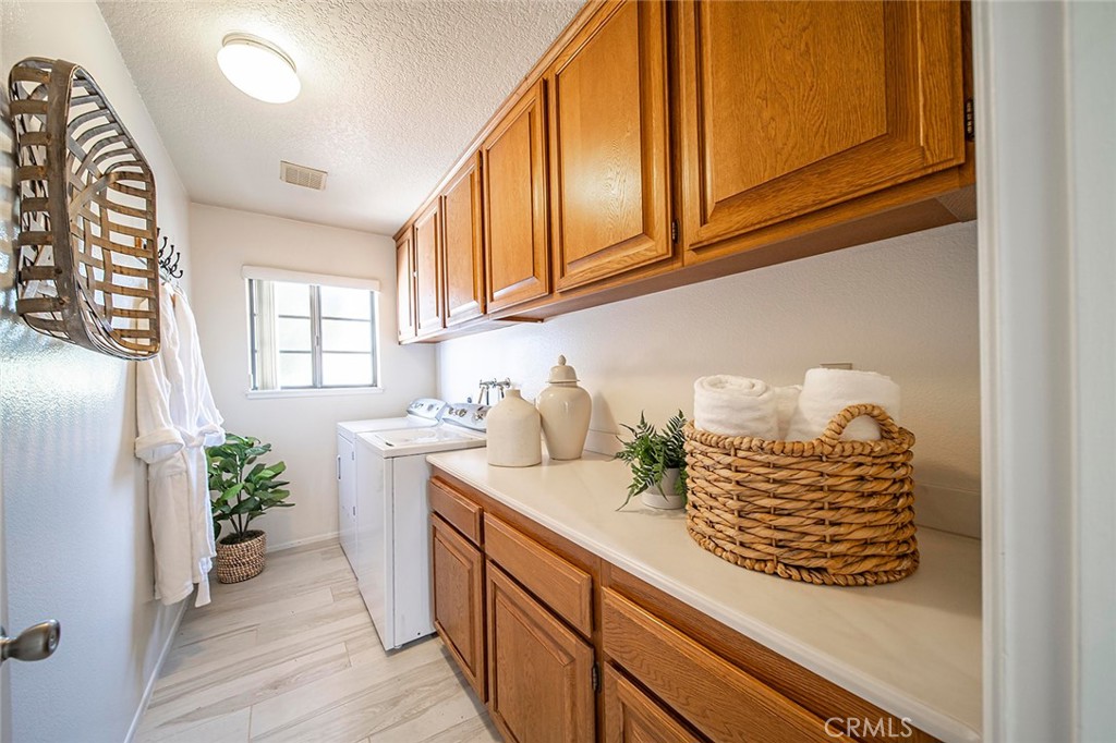 6247 Majorca Circle Long Beach, CA 90803 - Photo 46 of 57 a kitchen with stainless steel appliances granite countertop a sink a stove and a window