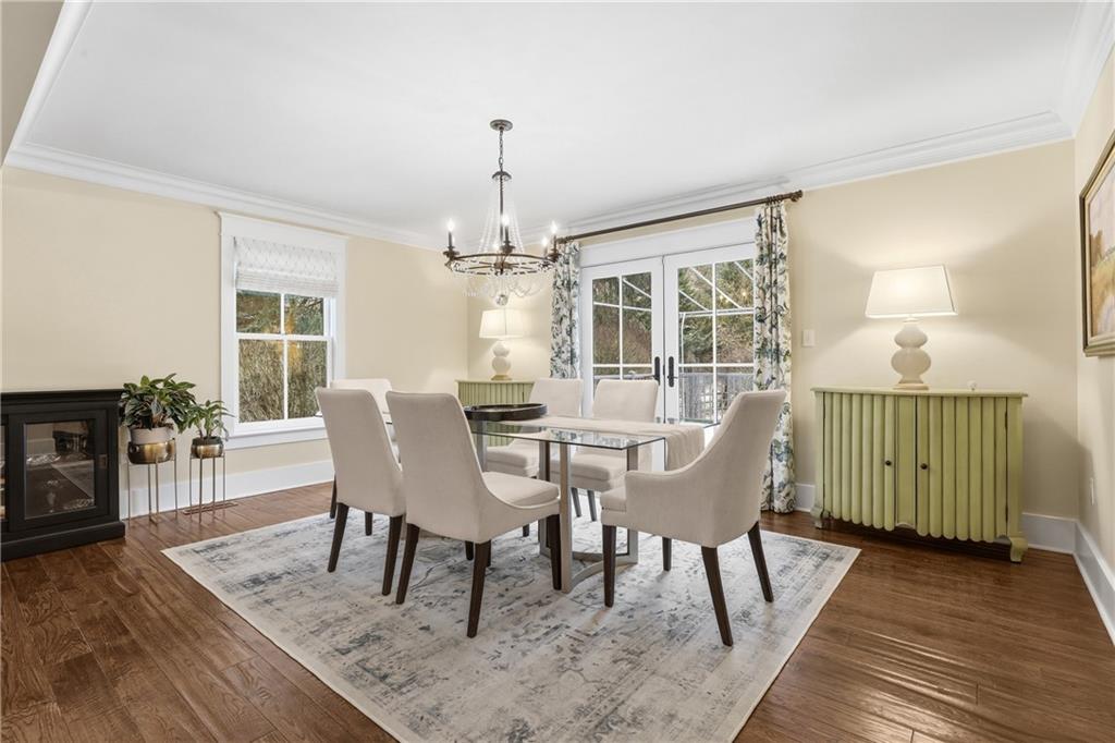 411 Woodland Road Sewickley, PA 15143 - Photo 12 of 46 a view of a dining room with furniture window and wooden floor