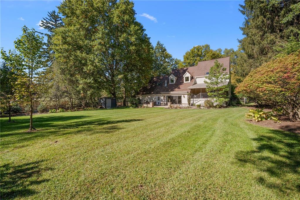 411 Woodland Road Sewickley, PA 15143 - Photo 2 of 46 a view of a park with large trees