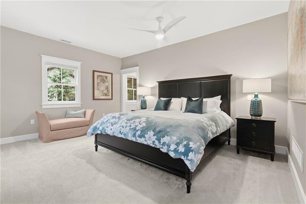 411 Woodland Road Sewickley, PA 15143 - Photo 24 of 46 a bedroom with a bed couch and window