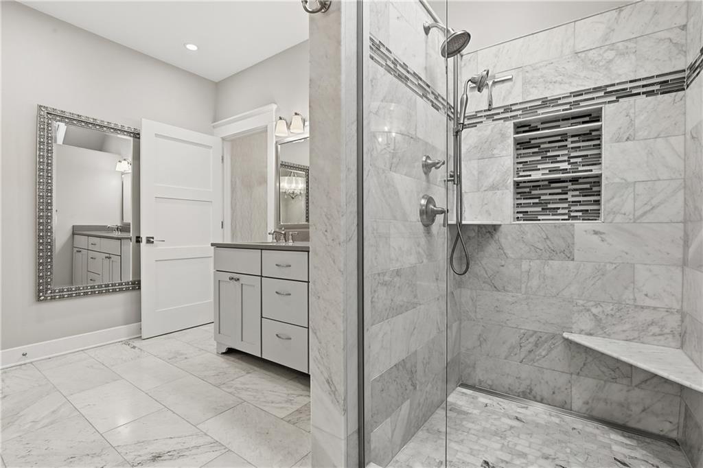 411 Woodland Road Sewickley, PA 15143 - Photo 30 of 46 a bathroom with a shower and a sink