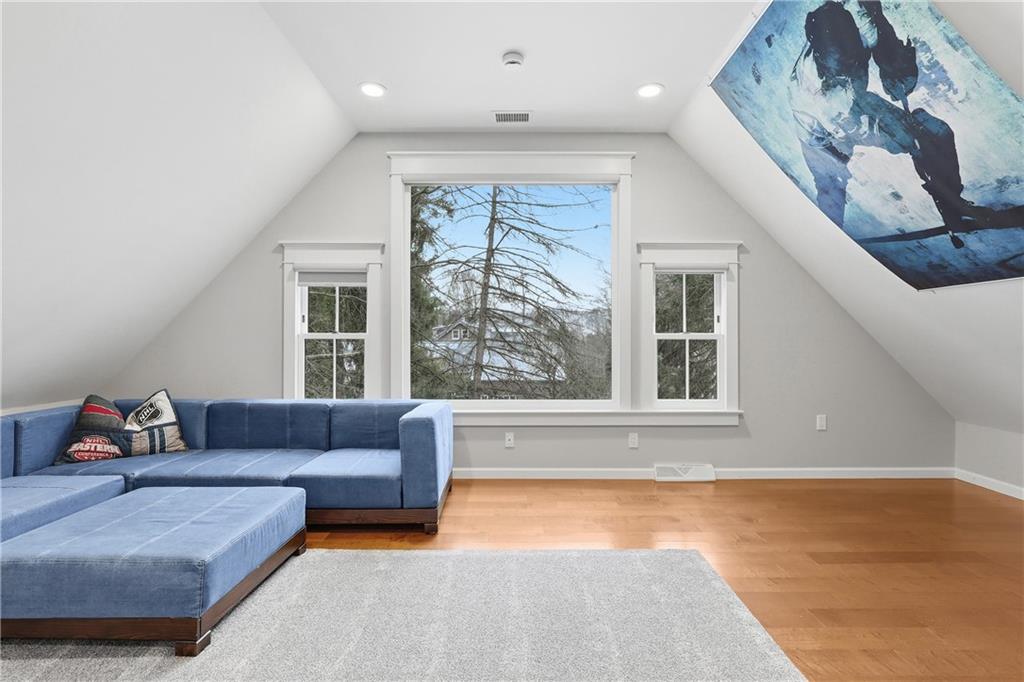 411 Woodland Road Sewickley, PA 15143 - Photo 35 of 46 a living room with furniture and a large window