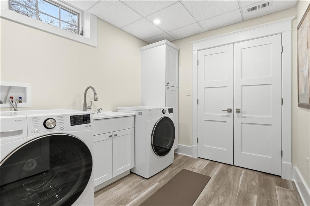 411 Woodland Road Sewickley, PA 15143 - Photo 40 of 46 a utility room with dryer and washer
