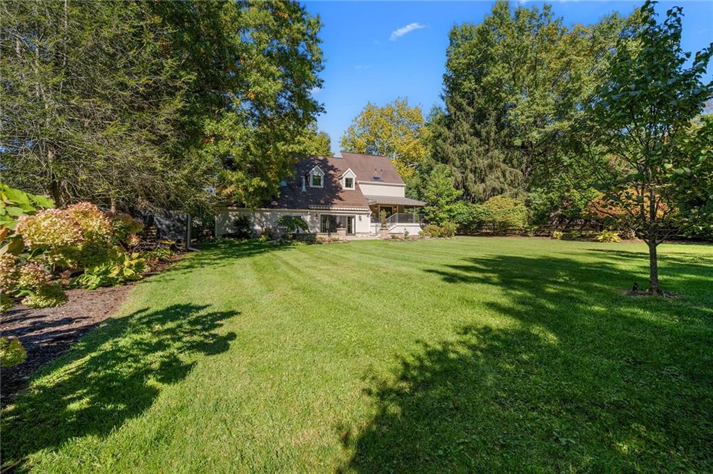 411 Woodland Road Sewickley, PA 15143 - Photo 41 of 46 a view of a town with large trees