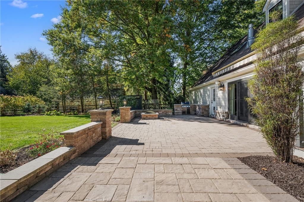 411 Woodland Road Sewickley, PA 15143 - Photo 43 of 46 a view of backyard with swimming pool and green space