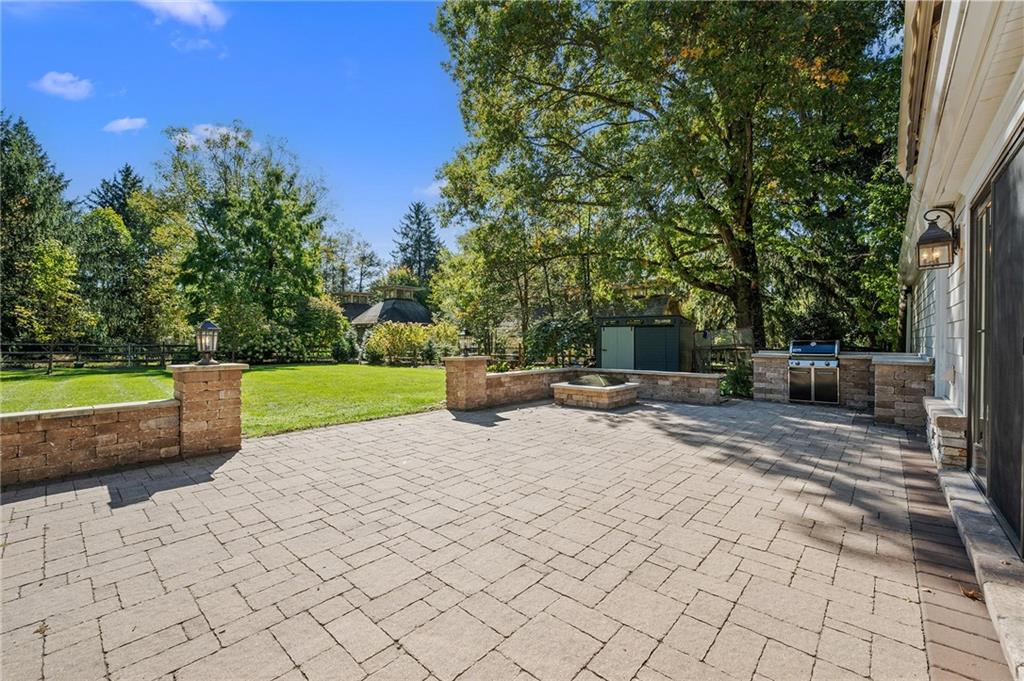 411 Woodland Road Sewickley, PA 15143 - Photo 44 of 46 a view of a swimming pool with a lounge chair