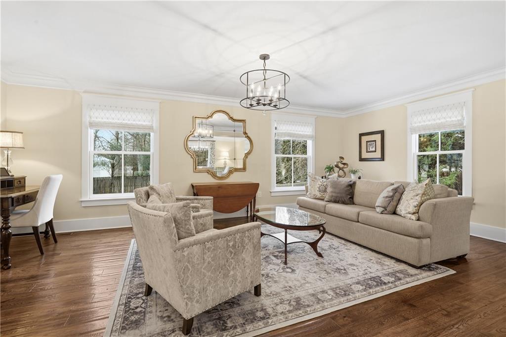 411 Woodland Road Sewickley, PA 15143 - Photo 7 of 46 a living room with fireplace furniture and a window