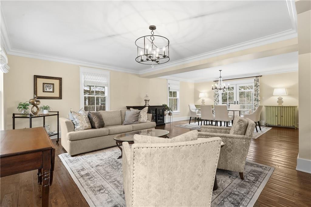 411 Woodland Road Sewickley, PA 15143 - Photo 10 of 46 a living room with fireplace furniture and a table