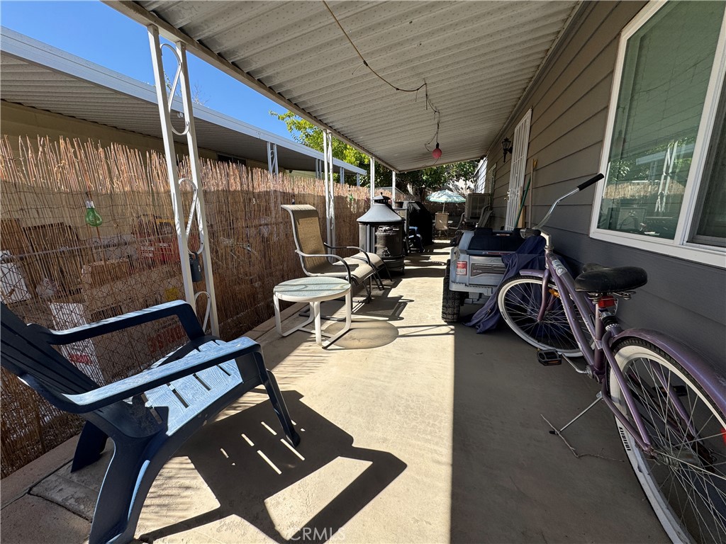 20683 Waalew Road, Unit B79 Apple Valley, CA 92307 - Photo 21 of 23 a view of a room with gym equipment