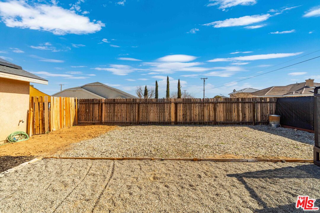 9516 Mendiburu Road California City, CA 93505 - Photo 28 of 32 a view of a backyard