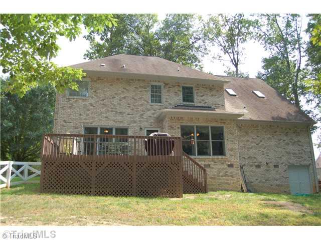 8400 Case Ridge Drive Oak Ridge, NC 27310 - Photo 15 of 16 Exterior Back.