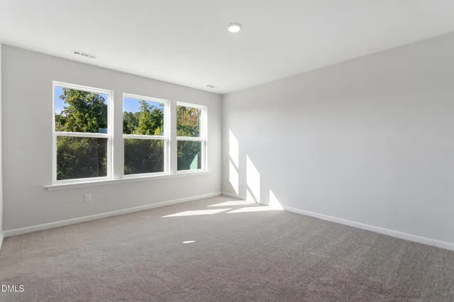a bathroom with a sink toilet vanity and bathtub