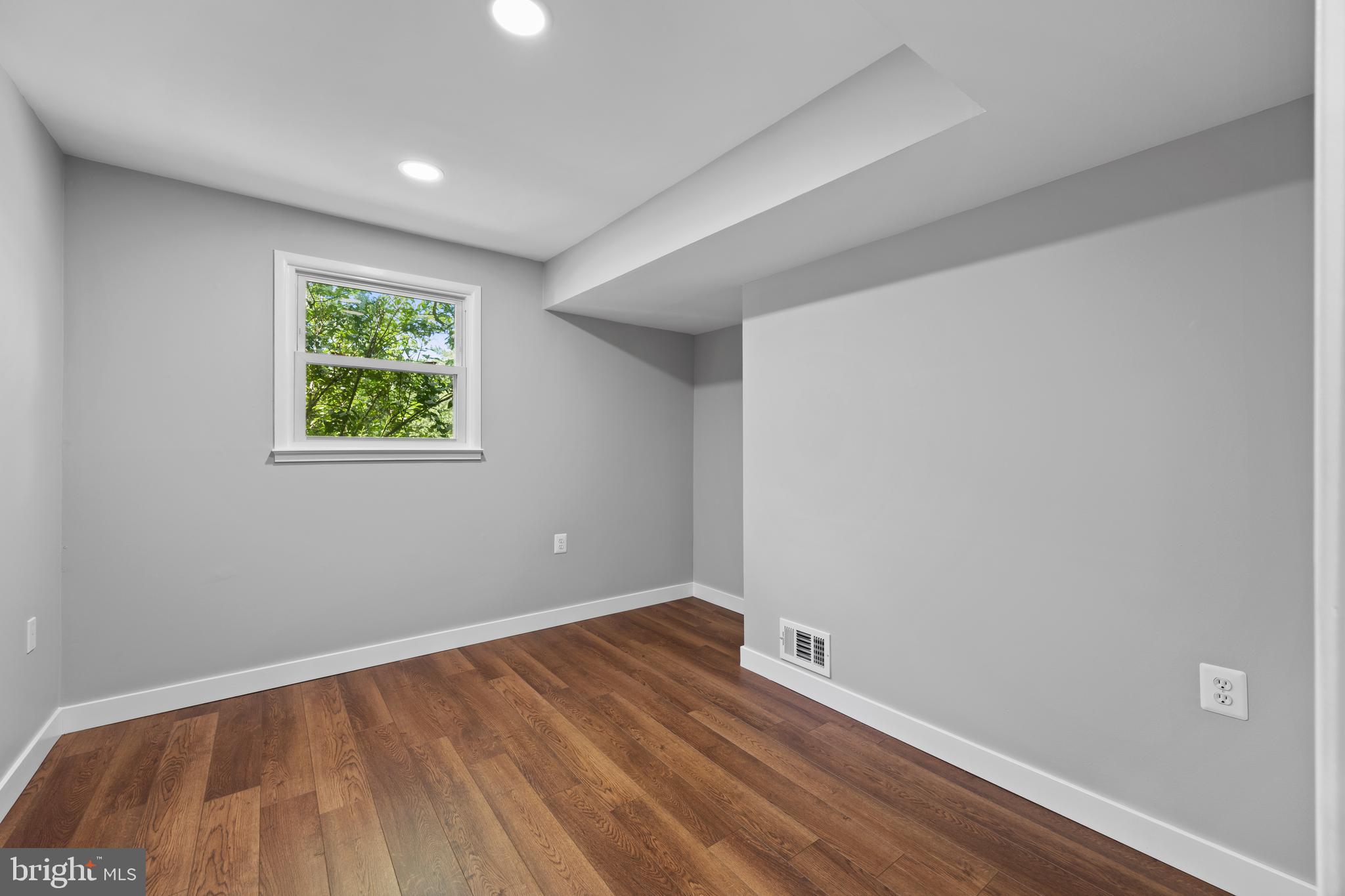 11019 Ring Road Reston, VA 20190 - Photo 54 of 78 a view of room with window and hardwood floor