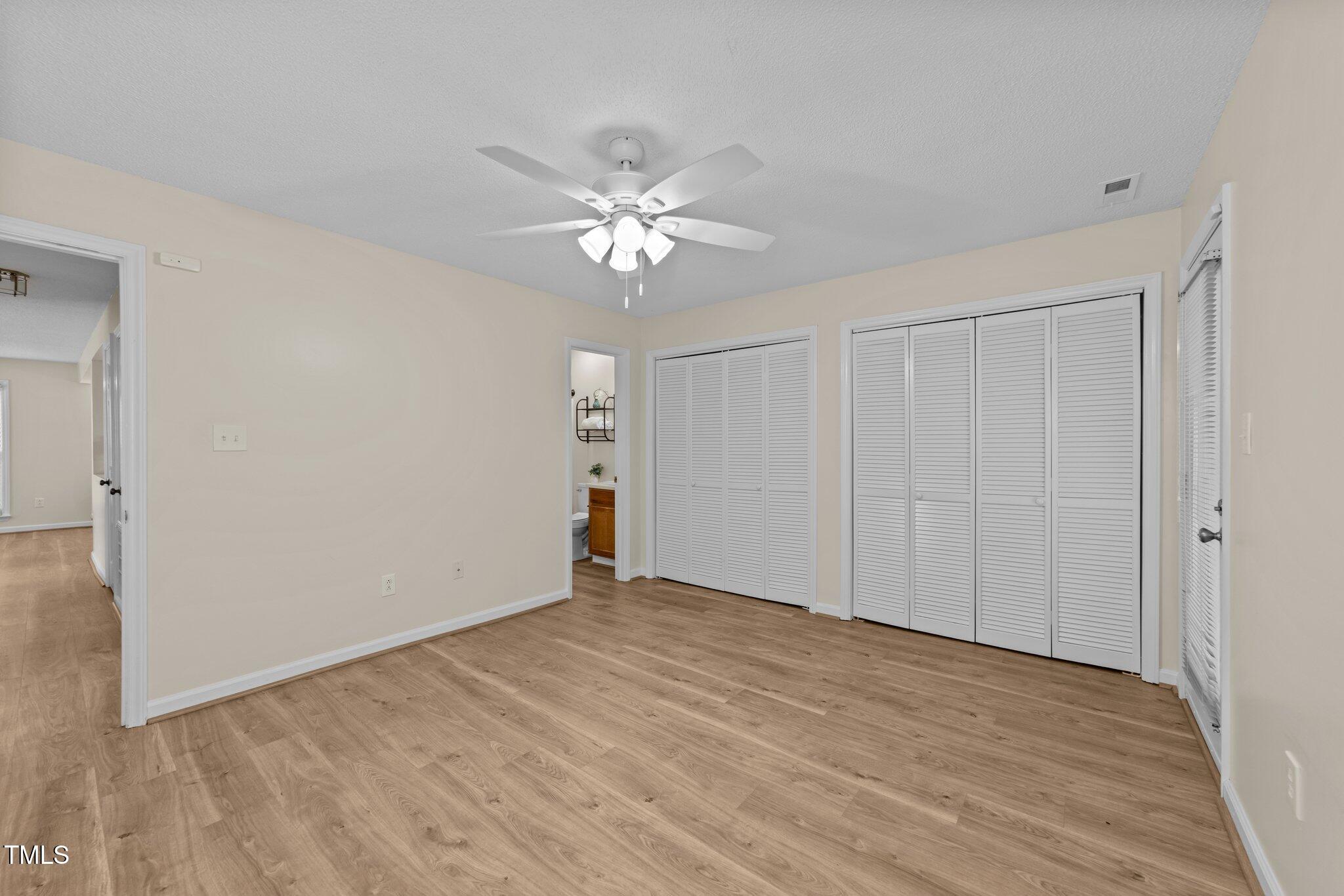 4611 Timbermill Court, Unit 201 Raleigh, NC 27612 - Photo 23 of 32 Primary Bedroom