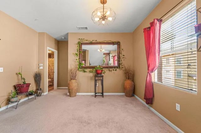 a view of a livingroom with furniture and windows