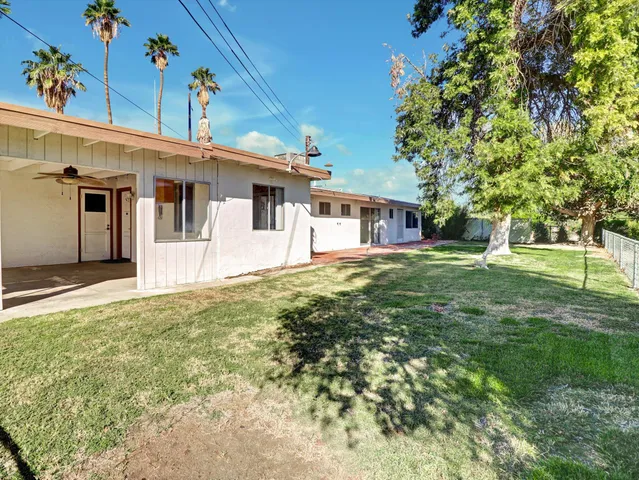 a house view with a garden space