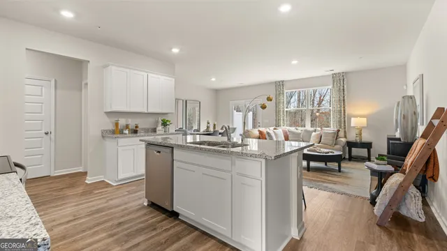 a bedroom with bed and a large window