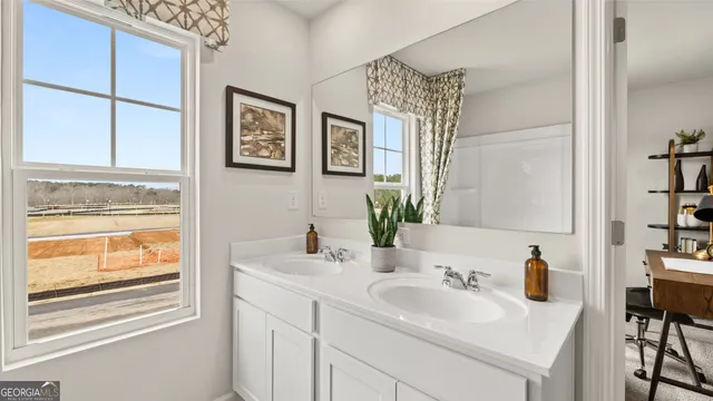 a bathroom with a toilet sink and bathtub
