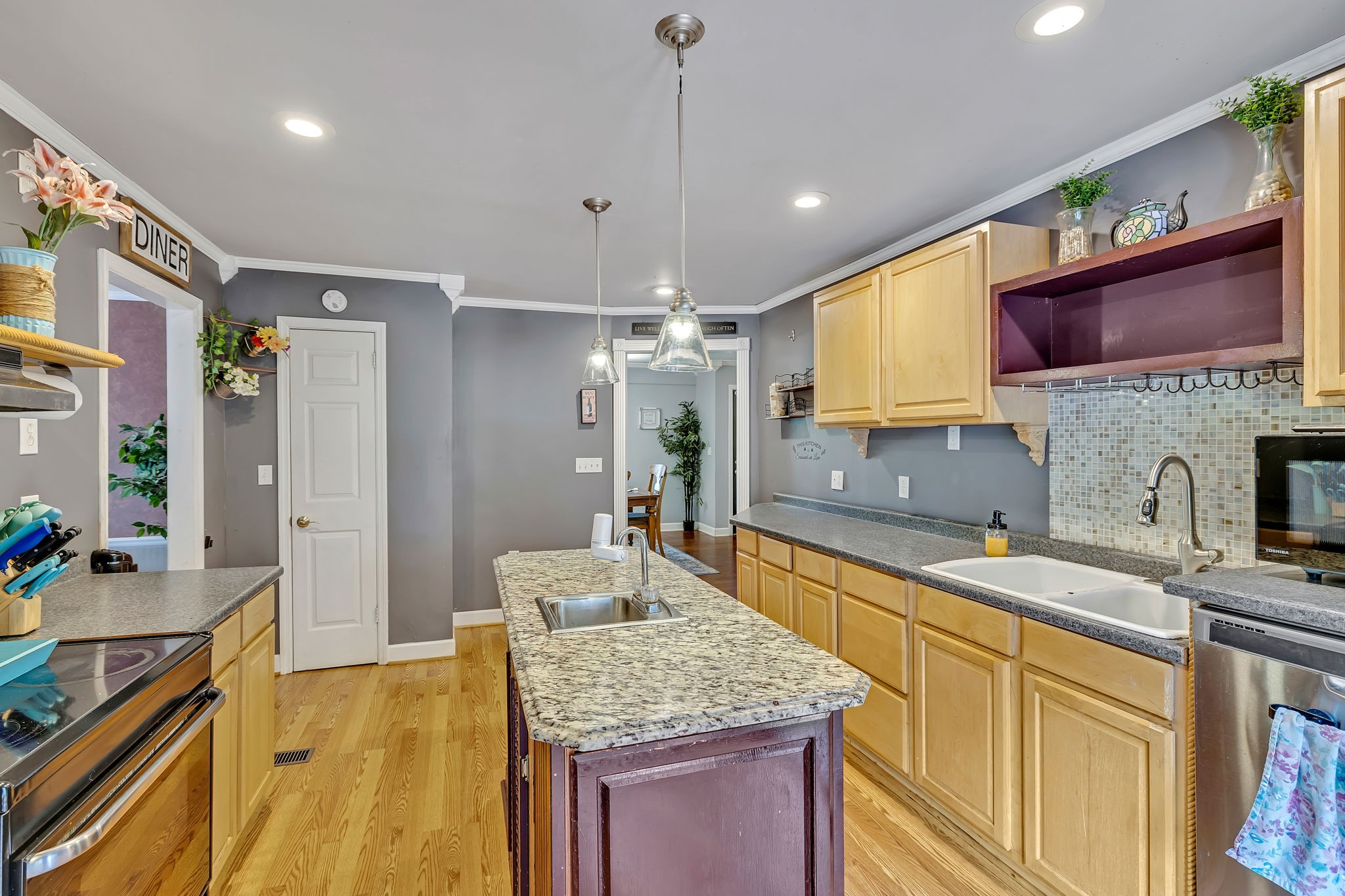 402 Springview Drive Franklin, TN 37064 - Photo 13 of 42 a kitchen with a sink stove and refrigerator