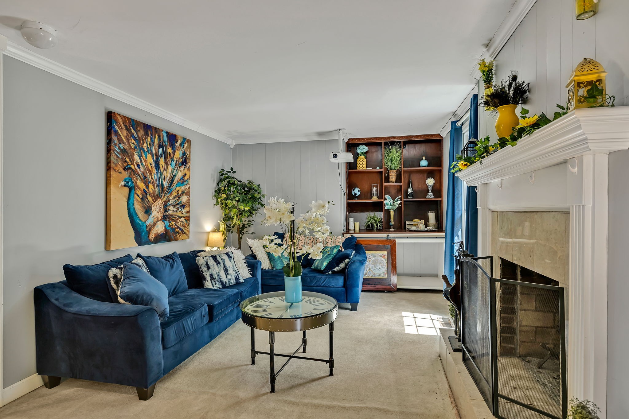 402 Springview Drive Franklin, TN 37064 - Photo 20 of 42 a living room with furniture and a book shelf
