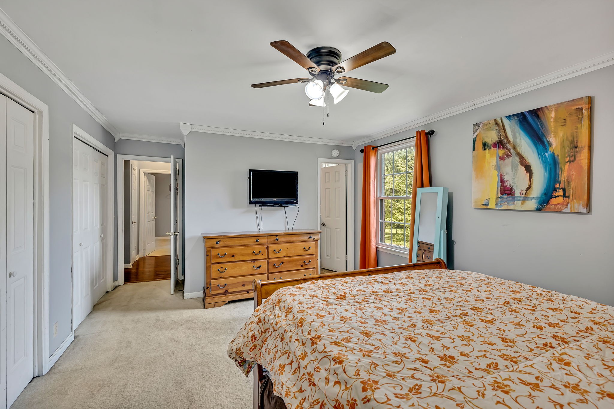 402 Springview Drive Franklin, TN 37064 - Photo 24 of 42 a bedroom with a bed and a flat screen tv