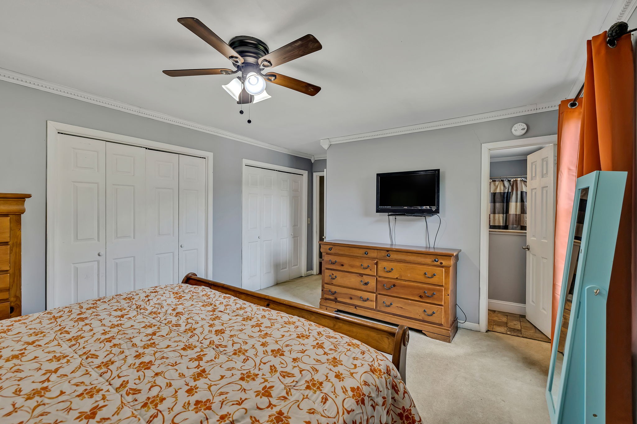 402 Springview Drive Franklin, TN 37064 - Photo 25 of 42 a bedroom with a bed and a flat screen tv