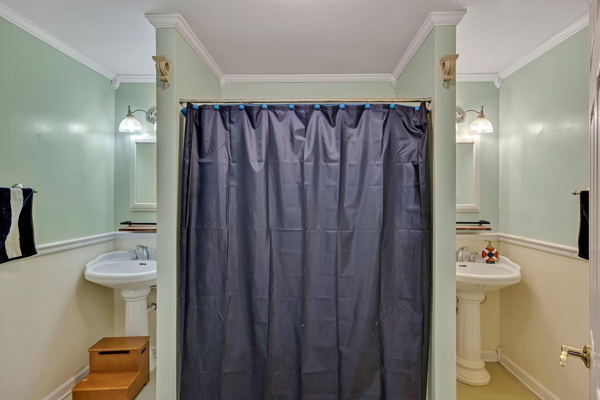 402 Springview Drive Franklin, TN 37064 - Photo 29 of 42 a bathroom with a sink a toilet and shower curtain