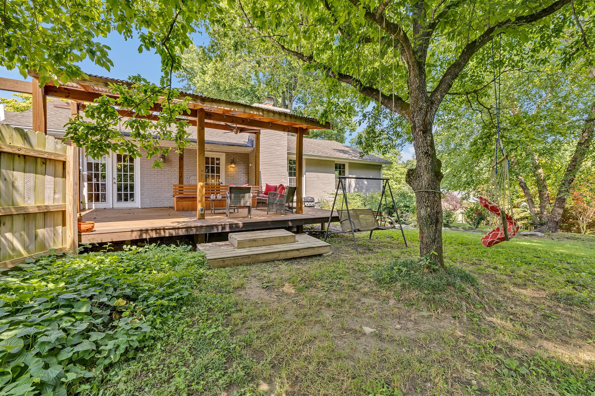 402 Springview Drive Franklin, TN 37064 - Photo 33 of 42 a view of a house with backyard porch and sitting area