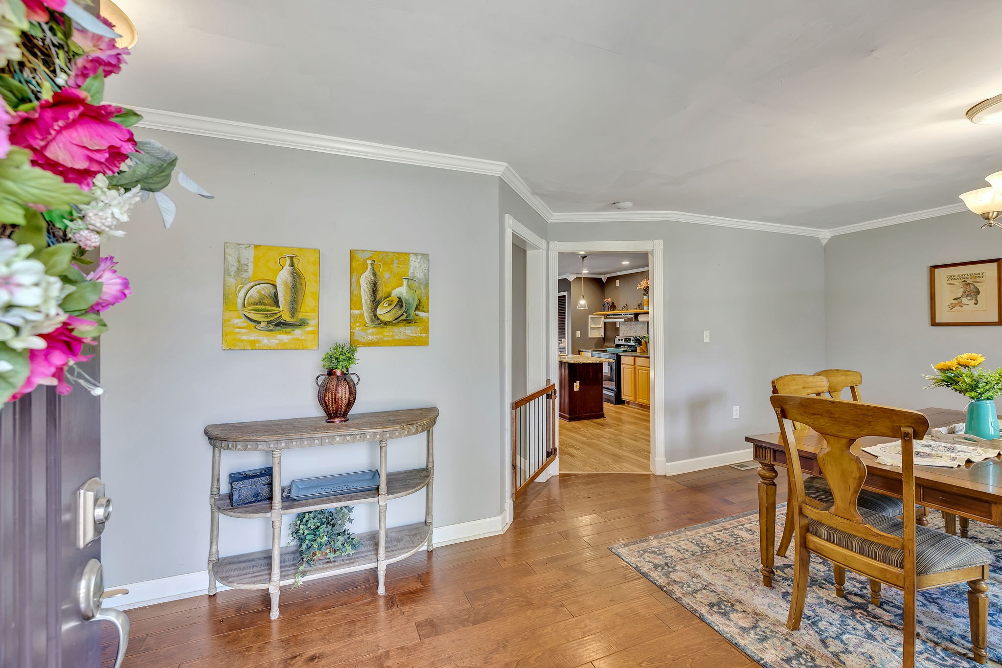 402 Springview Drive Franklin, TN 37064 - Photo 5 of 42 a view of a dining room with furniture and wooden floor