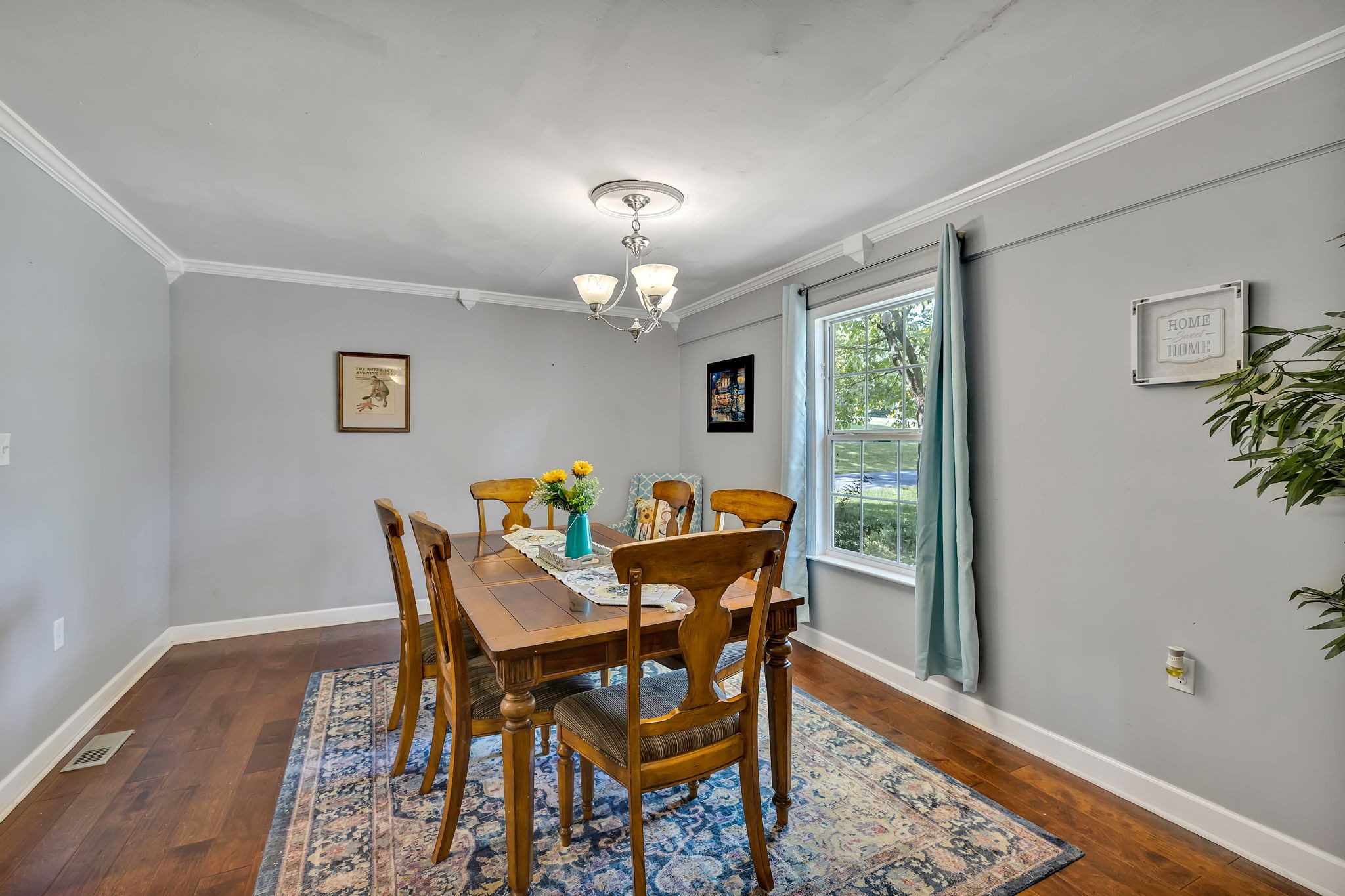 402 Springview Drive Franklin, TN 37064 - Photo 8 of 42 a view of a dining room with furniture and wooden floor
