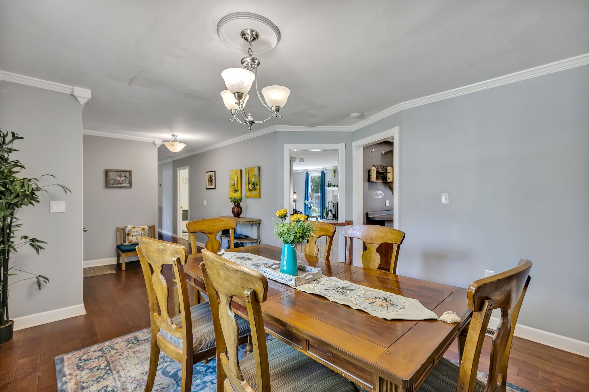 402 Springview Drive Franklin, TN 37064 - Photo 10 of 42 a view of a dining room with furniture and wooden floor