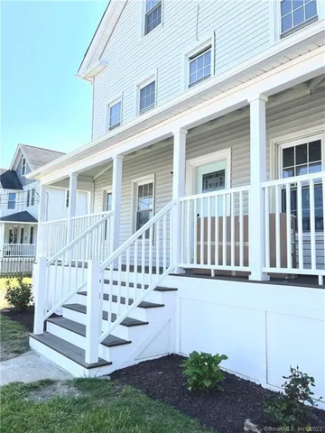 front view of a house with a small yard