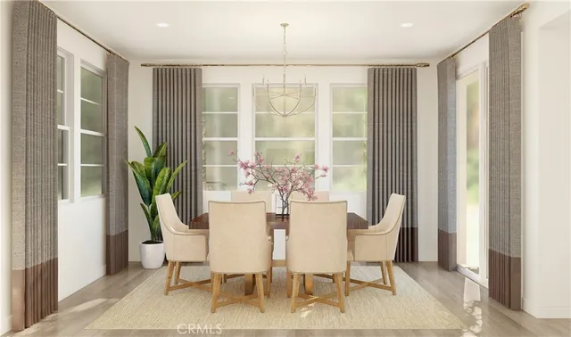 a large kitchen with a table and chairs