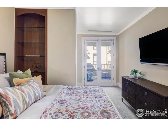 a living room with a couch and a flat screen tv