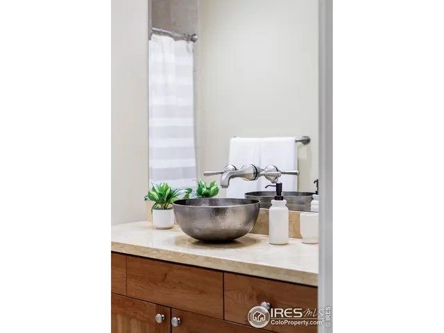 a room with a potted plant and a potted plant