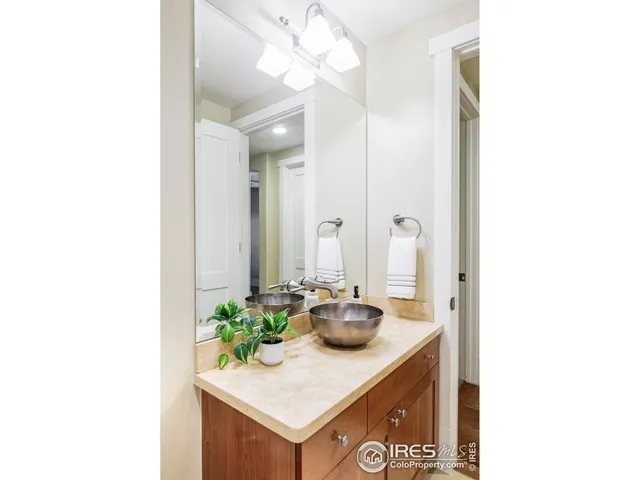 a room with sink and a mirror